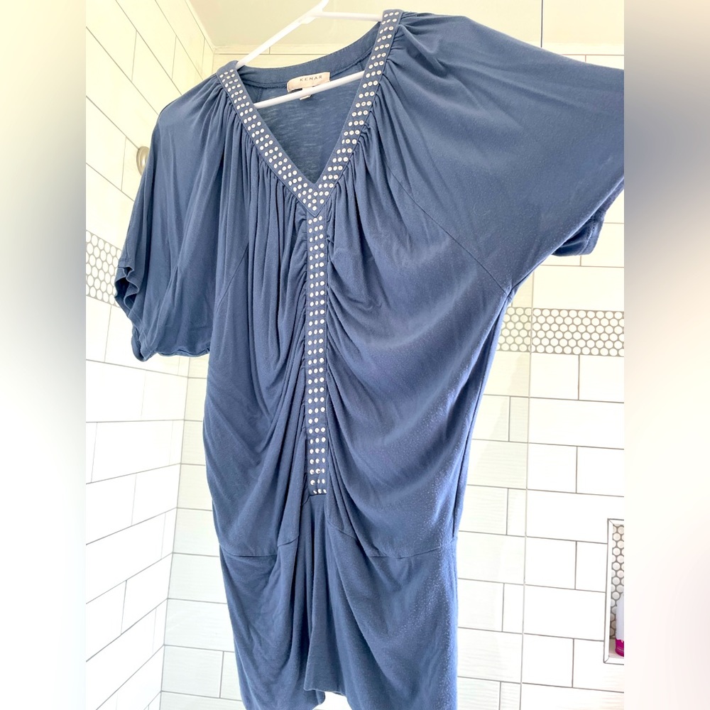 Blue top. gently used condition. Small but fits like a medium.